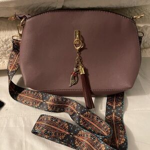 Chic Mauve Crossbody Bag with Patterned Strap and cat charm